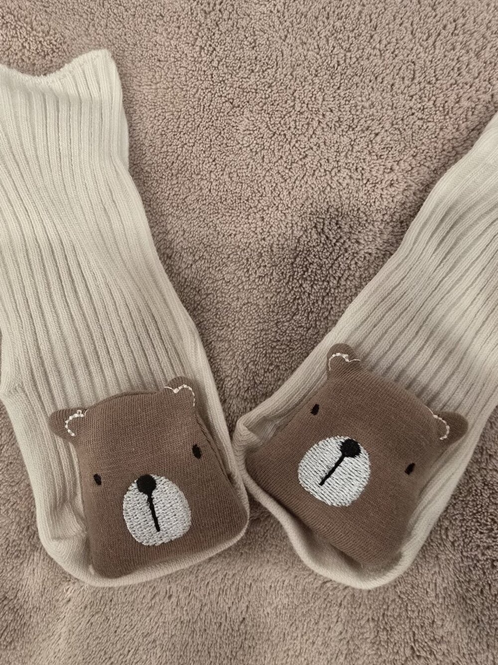 Soft Ribbed Baby Socks in a Neutral Cream Color With Cute Teddy Bear Face Detail
